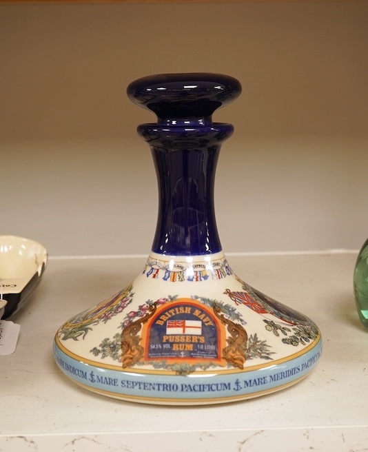 Wade 'Purser's Navy Rum Decanter' and two Captain Morgan rum boat ashtrays, decanter 24cm high